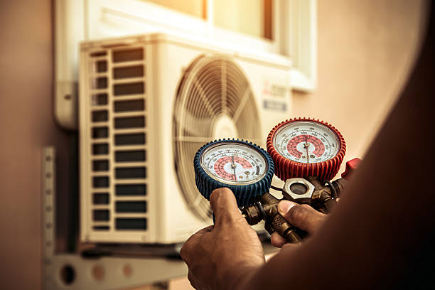 Professional Hvac technician working in Okahumpka, FL